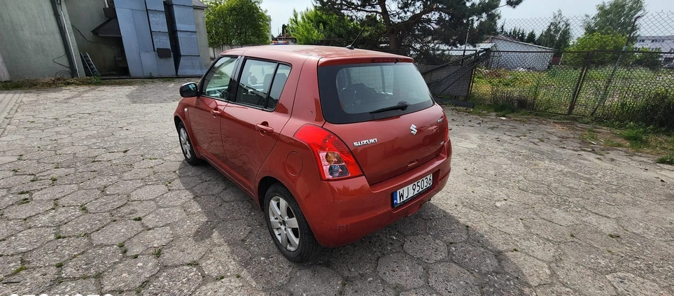Suzuki Swift cena 12900 przebieg: 156230, rok produkcji 2009 z Warszawa małe 67